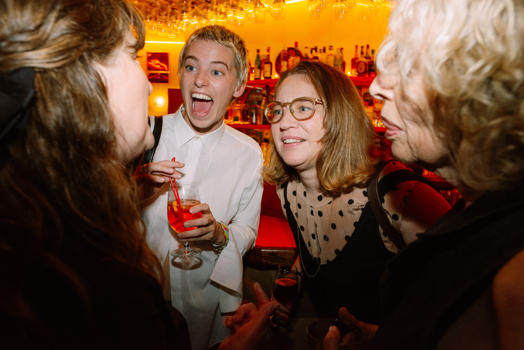 Afterparty toast at the bar