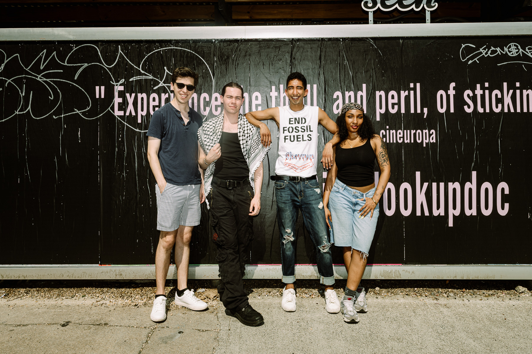 Group at the wild-posting quote wall