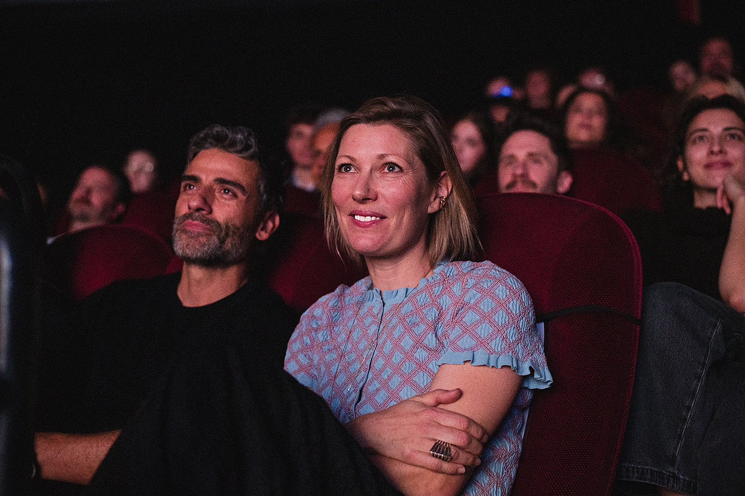 Guests watching from the theater audience