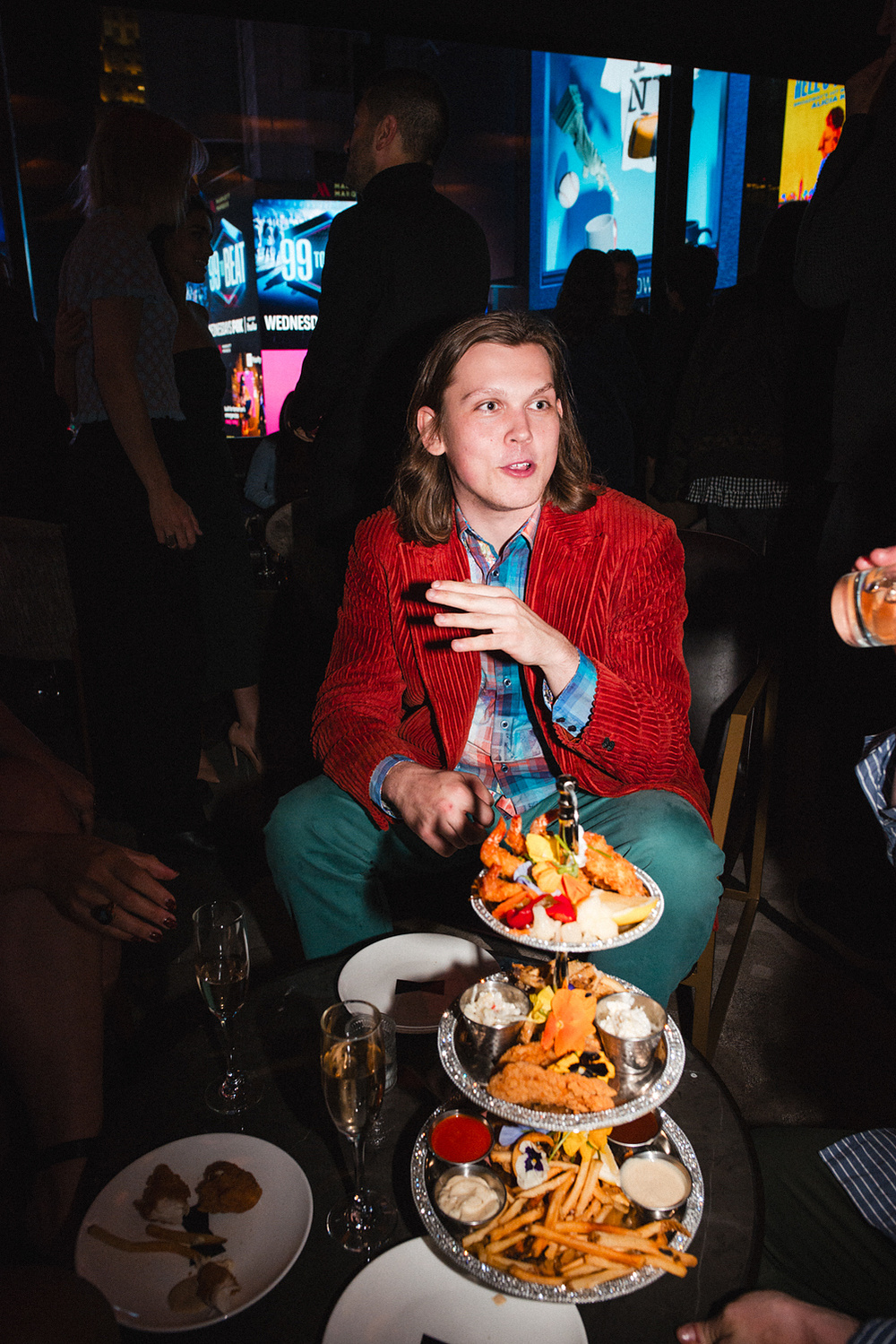 Guest at the afterparty table with a seafood platter