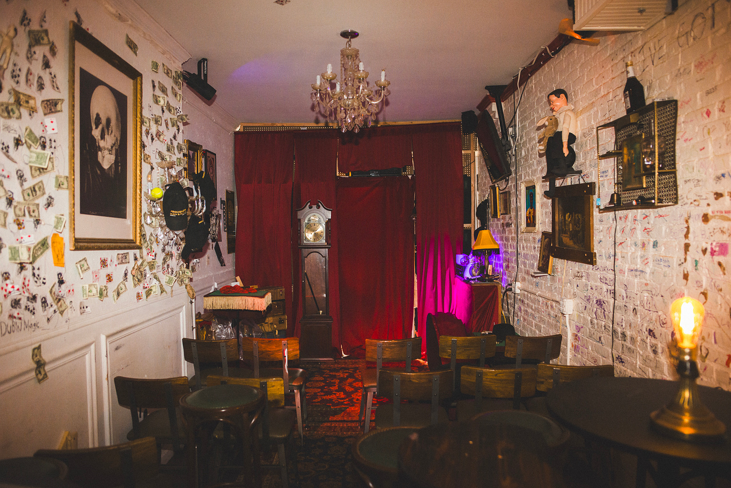 Venue interior, red curtain and grandfather clock
